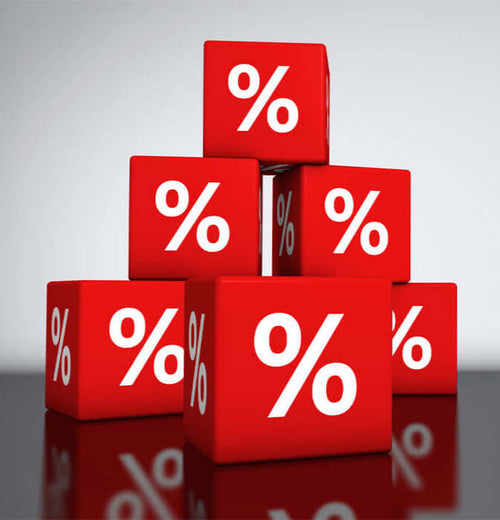 A stack of red blocks with white percentage symbols, representing discounts and sales promotions.